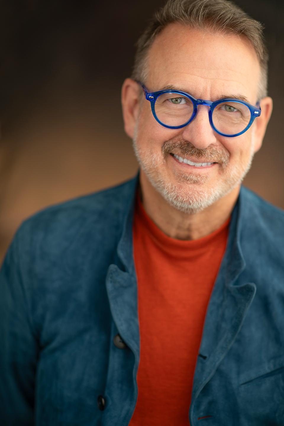 Ian James Corlett, the original English voice of Goku and corporate keynote speaker